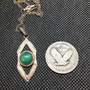 Sterling silver pendant.